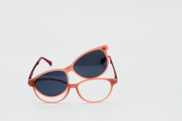 Conceptual elegant Sunglasses isolated on white background. Sun glasses summer accessories as...
