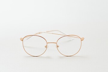 isolation glasses on white background. black and white combination oval eyeglass frames. oval eye...