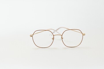 isolation glasses on white background. black and white combination oval eyeglass frames. oval eye glasses frame in the photo from above on a white background