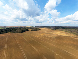 Fototapeta na wymiar Aerial view of agricultural landscape with fields in spring season