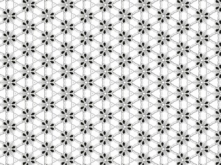 Modern pattern in the form of small flowers in black tones on a white background,