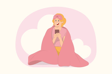 Young girl hold mobile cell phone chat sit wrap cover under blanket duvet concept