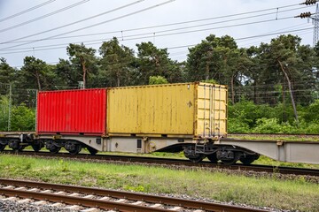 Fototapeta na wymiar Transport of goods by rail , container delivery