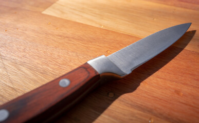 knife on wooden background