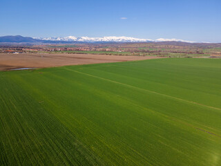 Fototapeta premium Aerial Spring landscape of Rural Land near town of Hisarya, Bulgaria