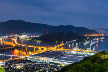 満月の夜、広島市黄金山から仁保ジャンクション方面の夜景