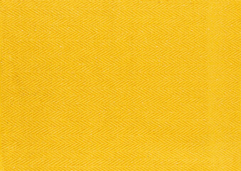 Closeup of yellow textile. Fabric details backdrop