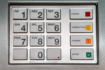 Closeup of Modern Silver Metal ATM Keypad. Select focus