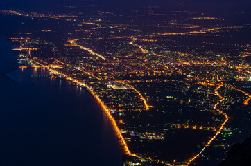 Aerial night view of Kalamata city, Greece. Kalamata is one of the most beautiful cities in Greece and a popular tourist destination