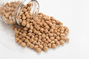glass jar with overturned chickpeas