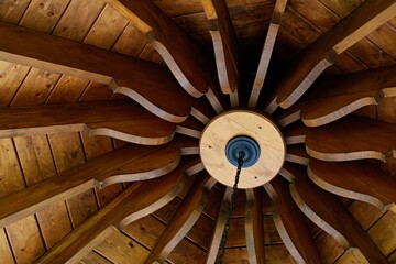 Gazebo wooden ceiling structure. Spiral effect