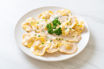 ravioli pasta with mushroom cream sauce and cheese