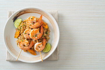 fried rice with shrimps skewers