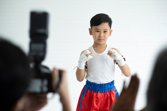 Kid Boxing, Young Boy Boxer, Poses For Press Conference