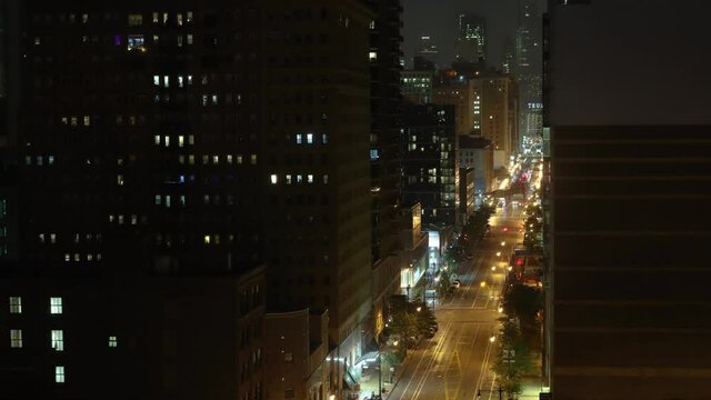 Chicago night time lapse showing traffic, and flickering windows.