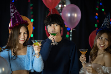 portrait of young people having happiness fun with friendship in new year tradition, smiling with alcohol in birthday party to joy with event in nightclub