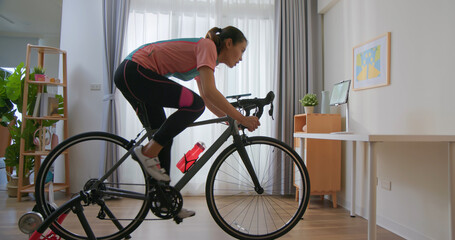 woman ride exercise bike