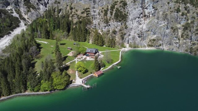 Mountain hut, refuge Gaisalm by the Achen lake in beautiful mountains in Austrian Tyrol.
