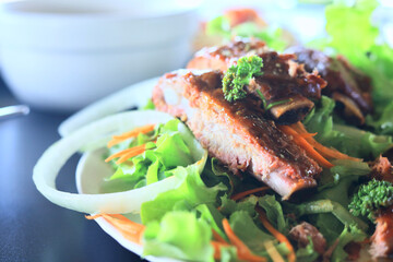 grilled pork with salad