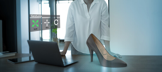 Futuristic fashion designer use technology of augmented mixed virtual reality, blockchain technology to make imagination design directly into reality. Customer can adjust which she need and send back