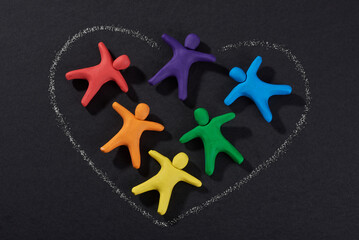 Multicultural people together. Justice and no racism concept. Gender and racial equality. DIY. Children's crafts from colored plasticine. Group of people in shape heart. - obrazy, fototapety, plakaty