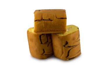 Cake roll vanilla, Japanese milk flavor scent with cream filling on isolated white background and copy space clipping paths.