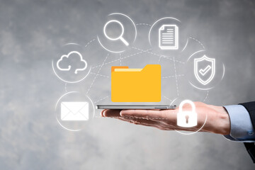 Document Management System DMS .Businessman hold folder and document icon.Software for archiving, searching and managing corporate files and information.Internet Technology Concept.Digital security