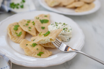 Pierogi ruskie, Baked dumplings stuffed with curd cheese and potatoes