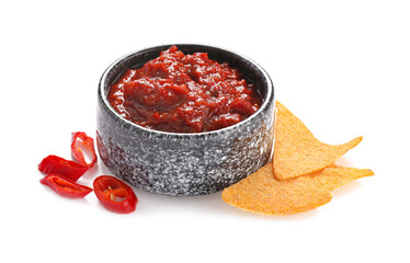 Bowl of chili sauce with nachos on white background