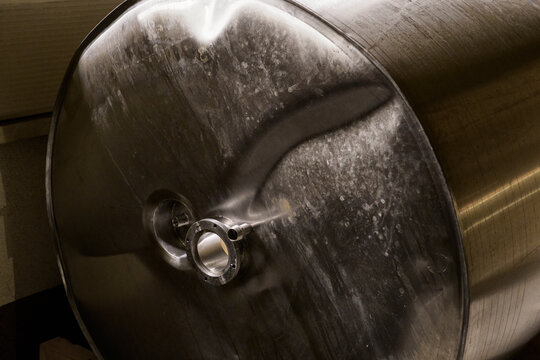 Extruded And Deformed Casing Of A Stainless Steel Tank.