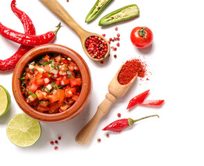Bowl of tasty salsa sauce and products on white background