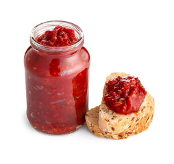 Jar of tasty salsa sauce and bread on white background