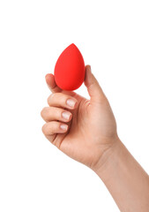 Female hand with makeup sponge on white background