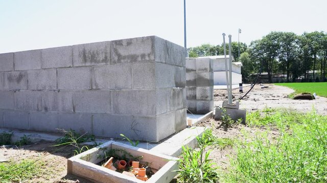 Building during construction. Shot in Summer.