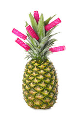 Fresh pineapple with curlers on white background