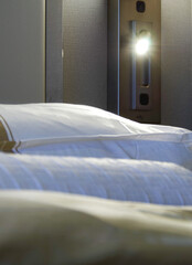 Comfortable double bed with duvet in luxurious oceanview or ocean view or outside or exterior...