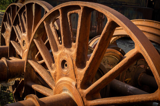 Rusted steam locomotive wheels cleaned from paint and dirt