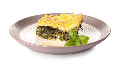 Plate with piece of tasty green lasagna and sauce on white background
