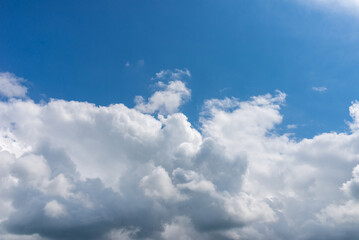 Blue sky white cloud fluffy gray clouds.dramatic blue sky,clouds warm summer day background.