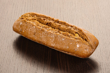 Crust tasty baguette over board