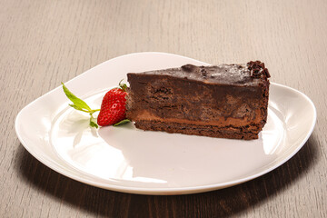 Sweet chocolate cake served strawberry