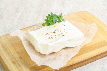 Greek Feta cheese over board