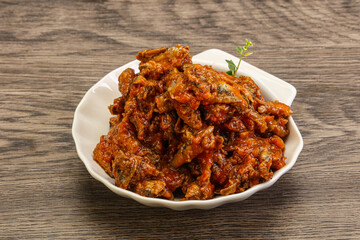 Canned anchovy in tomato sauce