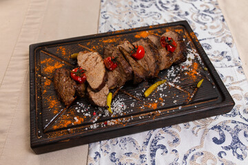 beef steak on a wooden board