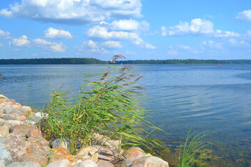 Beautiful landscape with lake in sunny summer day. Northwest Europe. Eco-tourism. Horizontal view. Wallpaper