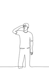 man stands covering his eyes with his hand like a visor, he is trying to see something in the distance - one line drawing. the concept of a beholder, observer, blind or poorly seeing person