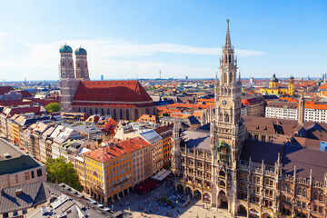 Fototapeta premium New Town Hall and Frauenkirche in Munich . Architecture of Marienplatz in Munich Bavaria Germany . Tourists visit Germany