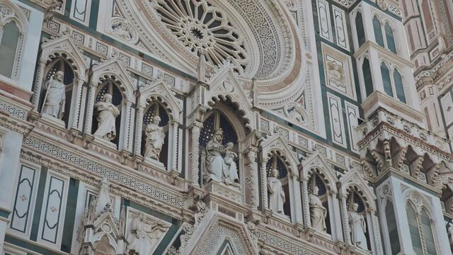 Architecture of historically and culturally rich Italian city of Florence. View of Basilica of Santa Croce, walking through city streets. Beautiful old town with medieval churches and cathedrals.
