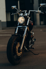 Freedom.Motorcycle parking, front view. Stylish custom chopper motobike with chrome details. Soft selective focus.