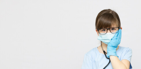 young blonde girl with toothache in medical mask banner copy space
